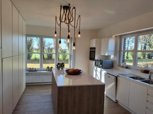 Kuchyň nebo kuchyňský kout v ubytování De Horizon in de Westhoek