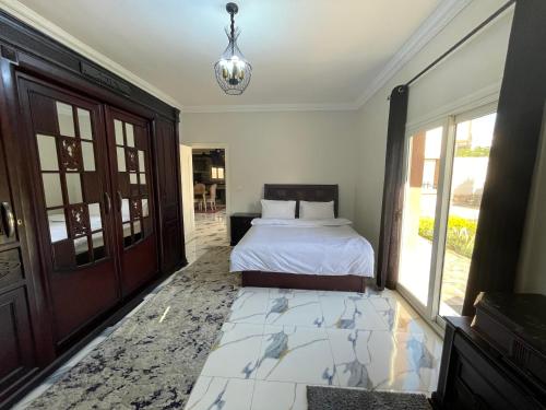 Postel nebo postele na pokoji v ubytování Nubian Villa with Private Pool