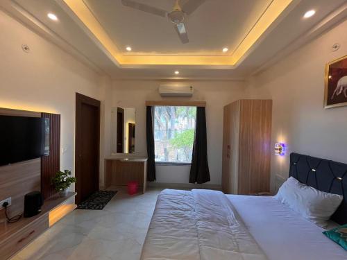 Ένα ή περισσότερα κρεβάτια σε δωμάτιο στο Kamal tourist guide and travel