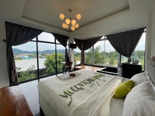 Postel nebo postele na pokoji v ubytování Nava Tara Resort