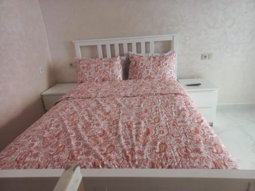 Ένα ή περισσότερα κρεβάτια σε δωμάτιο στο Quiet and comfortable apartment