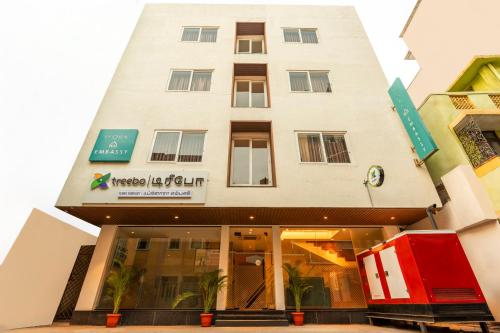 a building in front of a building at Treebo Flora Embassy in Chennai