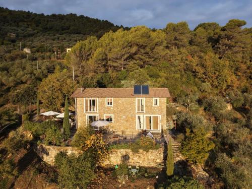 an aerial view of a house on a hill at Briciole di Pietra B&B in Dolceacqua