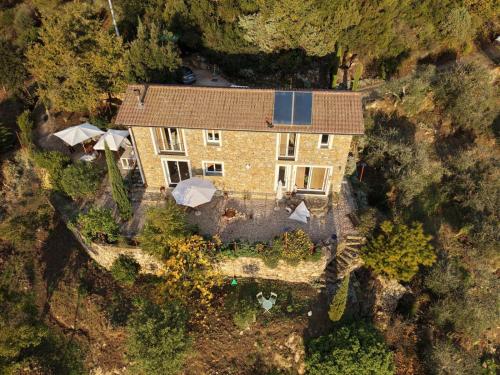 an aerial view of a large stone house at Briciole di Pietra B&B in Dolceacqua