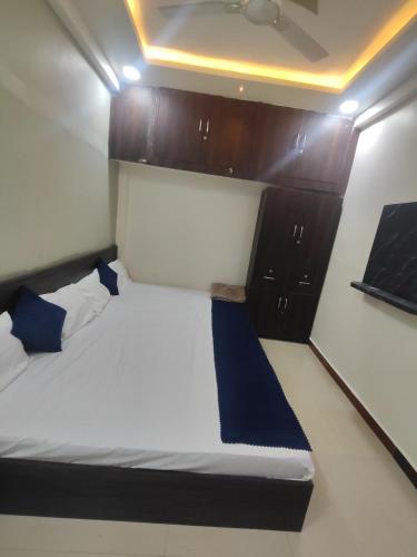 Ένα ή περισσότερα κρεβάτια σε δωμάτιο στο Hotel Mukhiya Palace