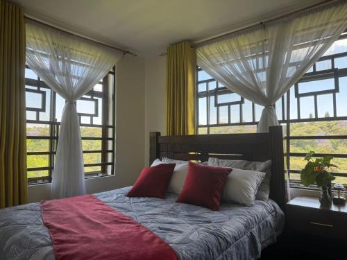 Postel nebo postele na pokoji v ubytování Hillsgate Experience a Luxury Home in Nairobi