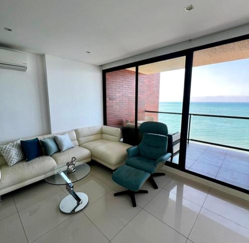 Zona de estar de Ocean View Total Comfort