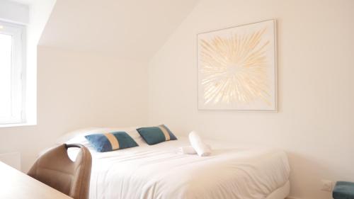 Ένα ή περισσότερα κρεβάτια σε δωμάτιο στο OPARADI 'Le Vert d'Opale' Douceur et sérénité