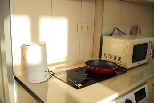 Kuchyň nebo kuchyňský kout v ubytování Despina Skyline