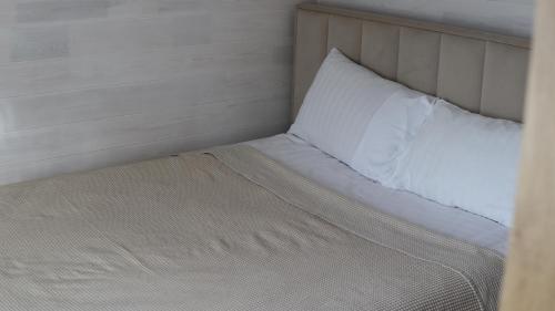 Ένα ή περισσότερα κρεβάτια σε δωμάτιο στο Перлина Ворохти