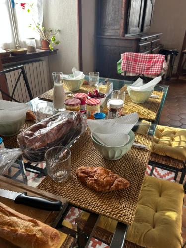 a table with some food on top of it at Maison Garesché - idéal télétravail & nature in Nieulle-sur-Seudre