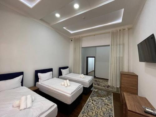 Postel nebo postele na pokoji v ubytování Avenue