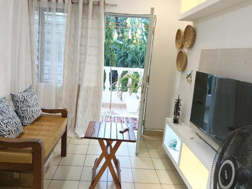 Een TV en/of entertainmentcenter bij Karean Studio suites
