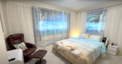 a bedroom with a bed and a chair and a window at Escape near to Siesta Key with Hot Tub, BBQ, and Fire pit in Sarasota