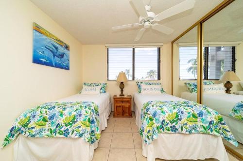 Postel nebo postele na pokoji v ubytování Kihei Akahi D402 · AKH D402 2BD Condo Across Beach Ocean View AC