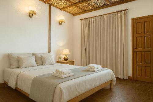 Postel nebo postele na pokoji v ubytování Redang Divers Resort