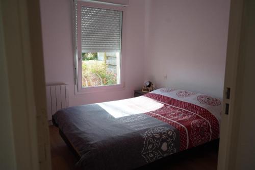 Postel nebo postele na pokoji v ubytování Alexandre