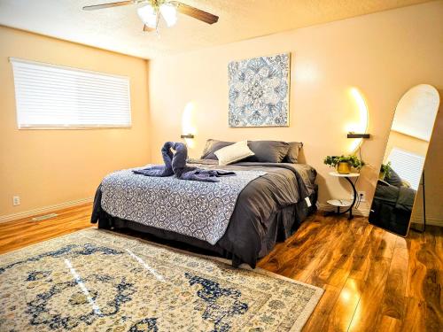 a bedroom with a bed and a rug at Spacious Ski Base Near The Best Resorts in Salt Lake City