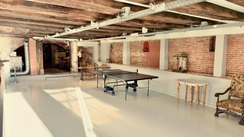 a dining room with a table and chairs at Top-notch space along canal in historic centre in Amsterdam