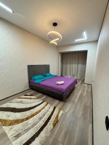 Postel nebo postele na pokoji v ubytování Квартира