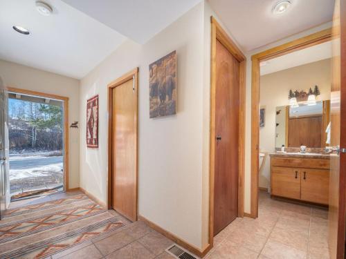 a bathroom with a sink and a toilet in a room at RMR: Primrose 1711 Condo in The AspensWilsonWY in Wilson