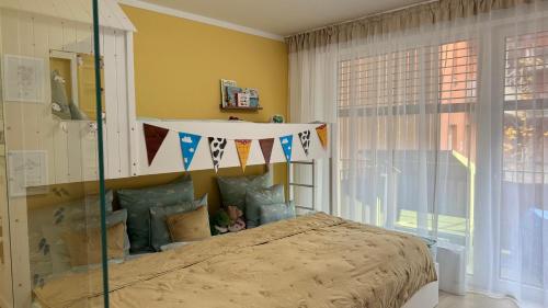 Postel nebo postele na pokoji v ubytování Benjamínek rodinný apartmán