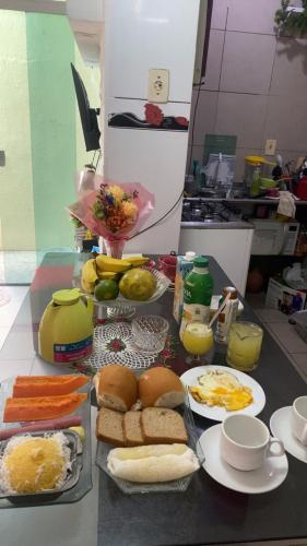 a table with a bunch of food on it at HospCOP in Belém