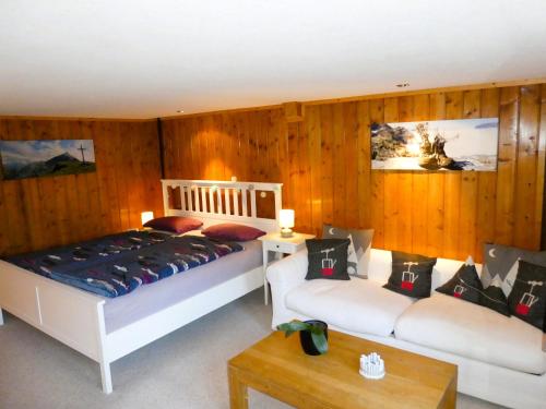 Postel nebo postele na pokoji v ubytování Apartment Steini since 1574