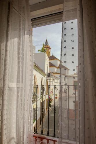 a view of a street from a window at Casa Centro Los Remedios in Estepona