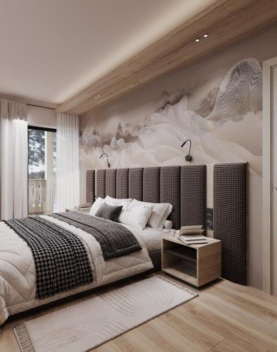 Postel nebo postele na pokoji v ubytování Mountain Chalet Costes