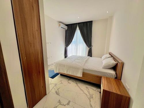 Ένα ή περισσότερα κρεβάτια σε δωμάτιο στο 233 Boulevard - Luxury Apartments