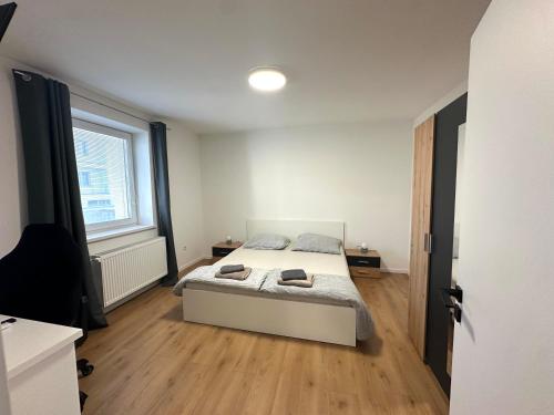 Ένα ή περισσότερα κρεβάτια σε δωμάτιο στο Apartmán Zamarovce