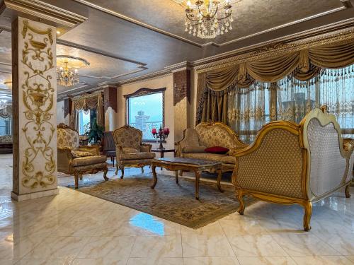 Posezení v ubytování royal pyramids palace