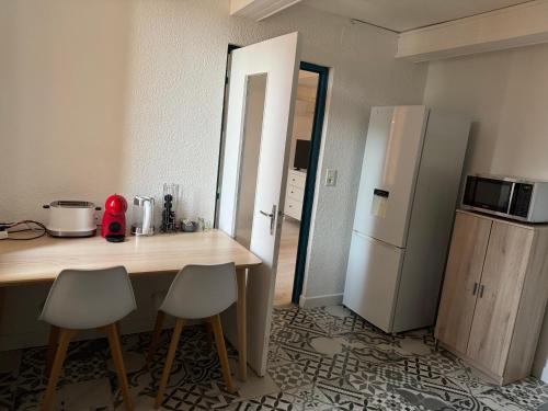 Η κουζίνα ή μικρή κουζίνα στο Cozy appartement