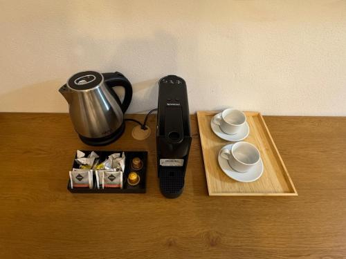 Příslušenství pro přípravu čaje a kávy v ubytování Apartmány u Ričiho-Snowland Valčianska dolina