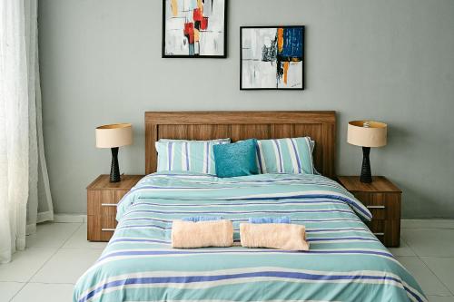 Ένα ή περισσότερα κρεβάτια σε δωμάτιο στο The Galleria