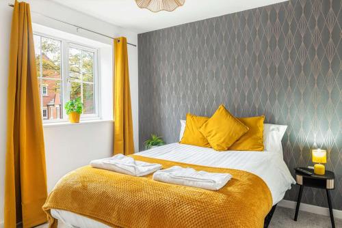 En eller flere senge i et værelse på 4-Bed Spacious House Perfect for Long-Term Stays