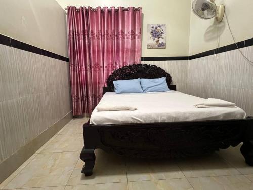 Ένα ή περισσότερα κρεβάτια σε δωμάτιο στο Mohaleap Shanghai Guest House