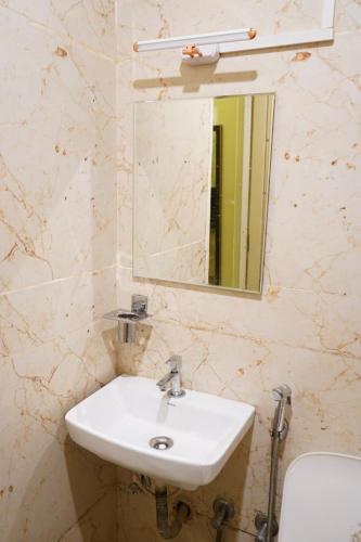 Koupelna v ubytování Alphineglow Hotel