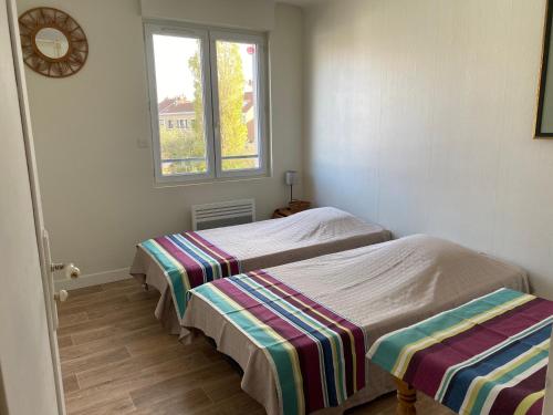 Llit o llits en una habitació de mer plage dunkerque