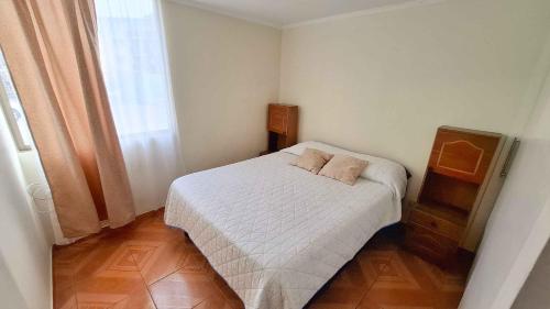 Postel nebo postele na pokoji v ubytování D11-4 Depto diario Arica