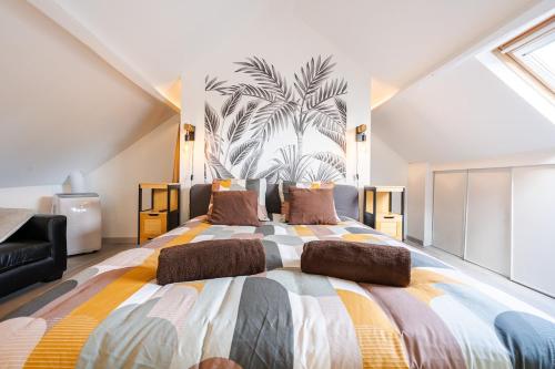 Postel nebo postele na pokoji v ubytování Le Loft, chic et cozy