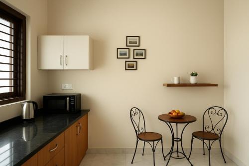 Η κουζίνα ή μικρή κουζίνα στο Happy Home Jaipur - Peaceful Villa with Garden