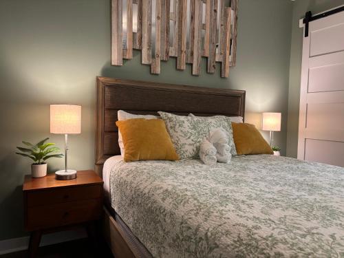 Giường trong phòng chung tại The Woodward Unit A