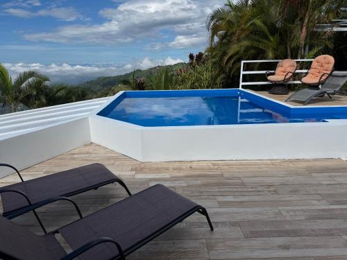 a swimming pool on the roof of a house at Palco Pacífico Villa with Private Rooftop Pool in Alto del Monte