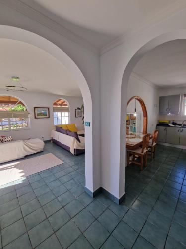 Ένα ή περισσότερα κρεβάτια σε δωμάτιο στο Villa Palmera Dorada