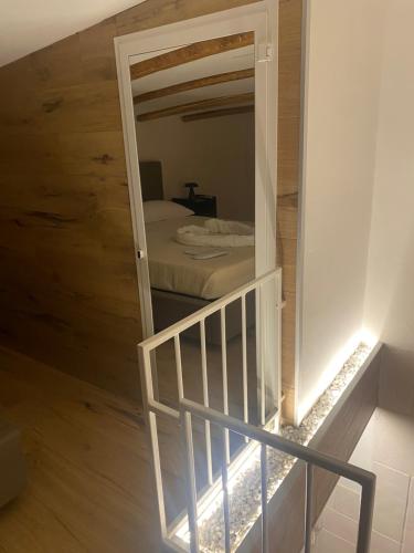 a small bedroom with a bunk bed in a room at Claustro Segreto - ALTAMURA in Altamura