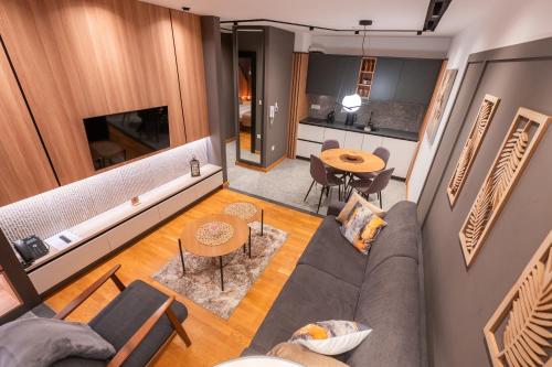 an overhead view of a living room and kitchen at Modern Mountain - Comfort Apartment in Kolašin