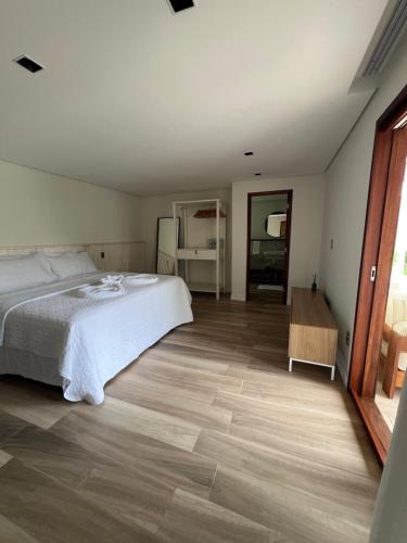 Postel nebo postele na pokoji v ubytování Residência Vittoria