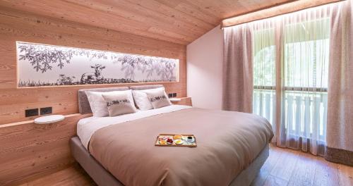 Postel nebo postele na pokoji v ubytování Albergo Riglarhaus